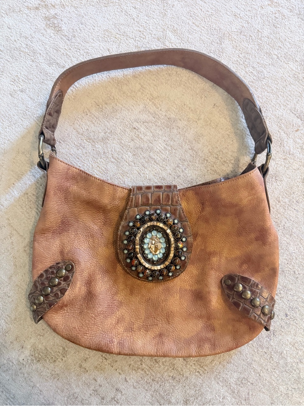 Handcrafted Brown Leather Shoulder Bag with Beaded Accent